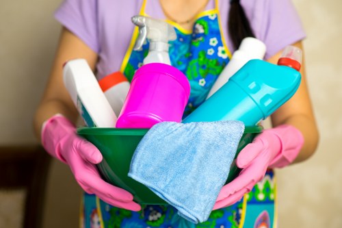 Carpet cleaning team preparing equipment safely before work begins