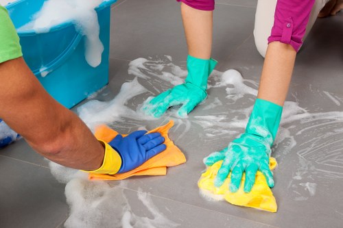 Carpet cleaning team working safely in a Hornsey home