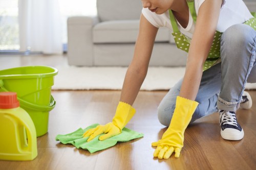 Professional carpet cleaners confirming booking details for a service appointment